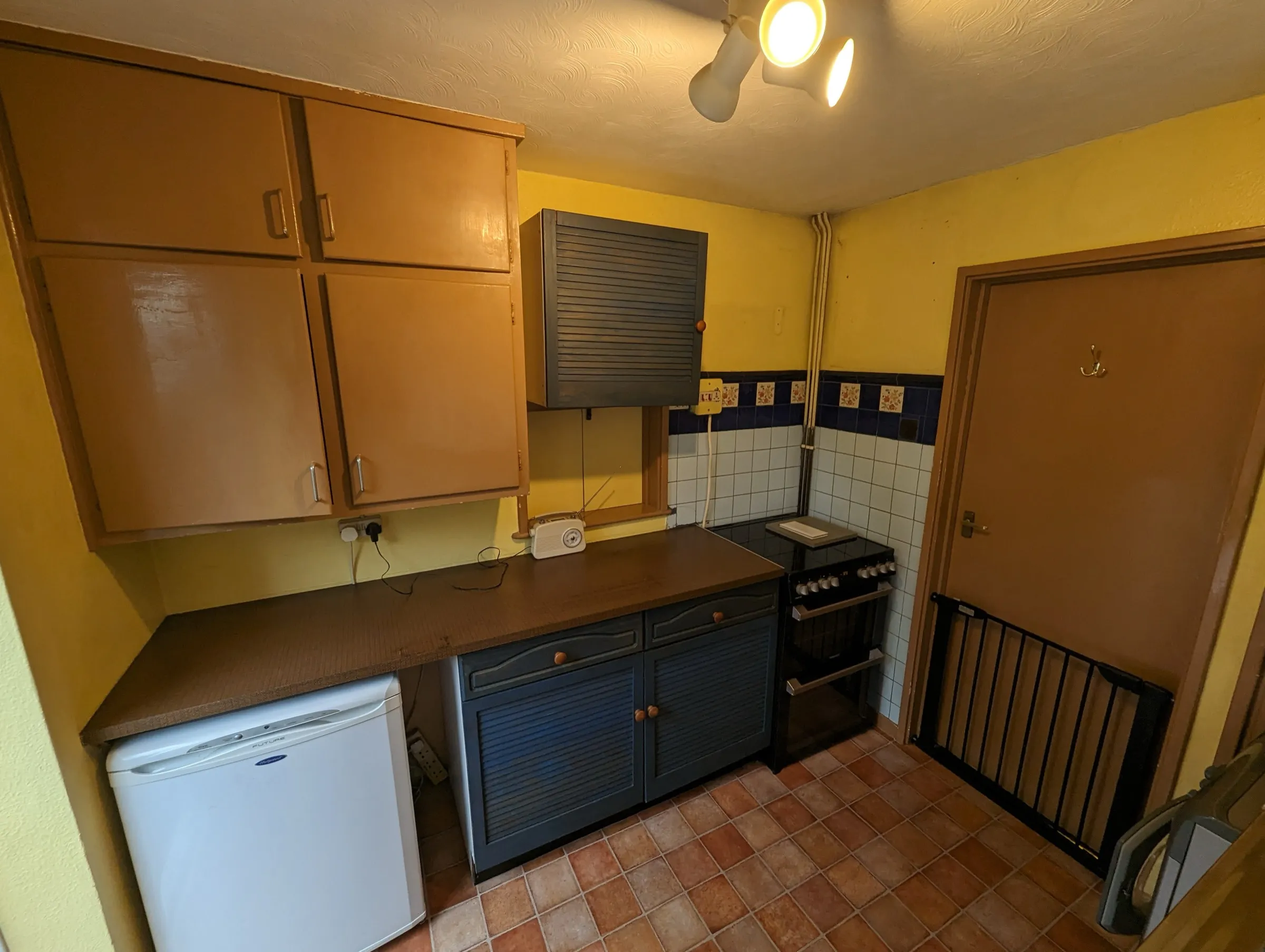 Before the refit: another angle on the tired units and freestanding cooker