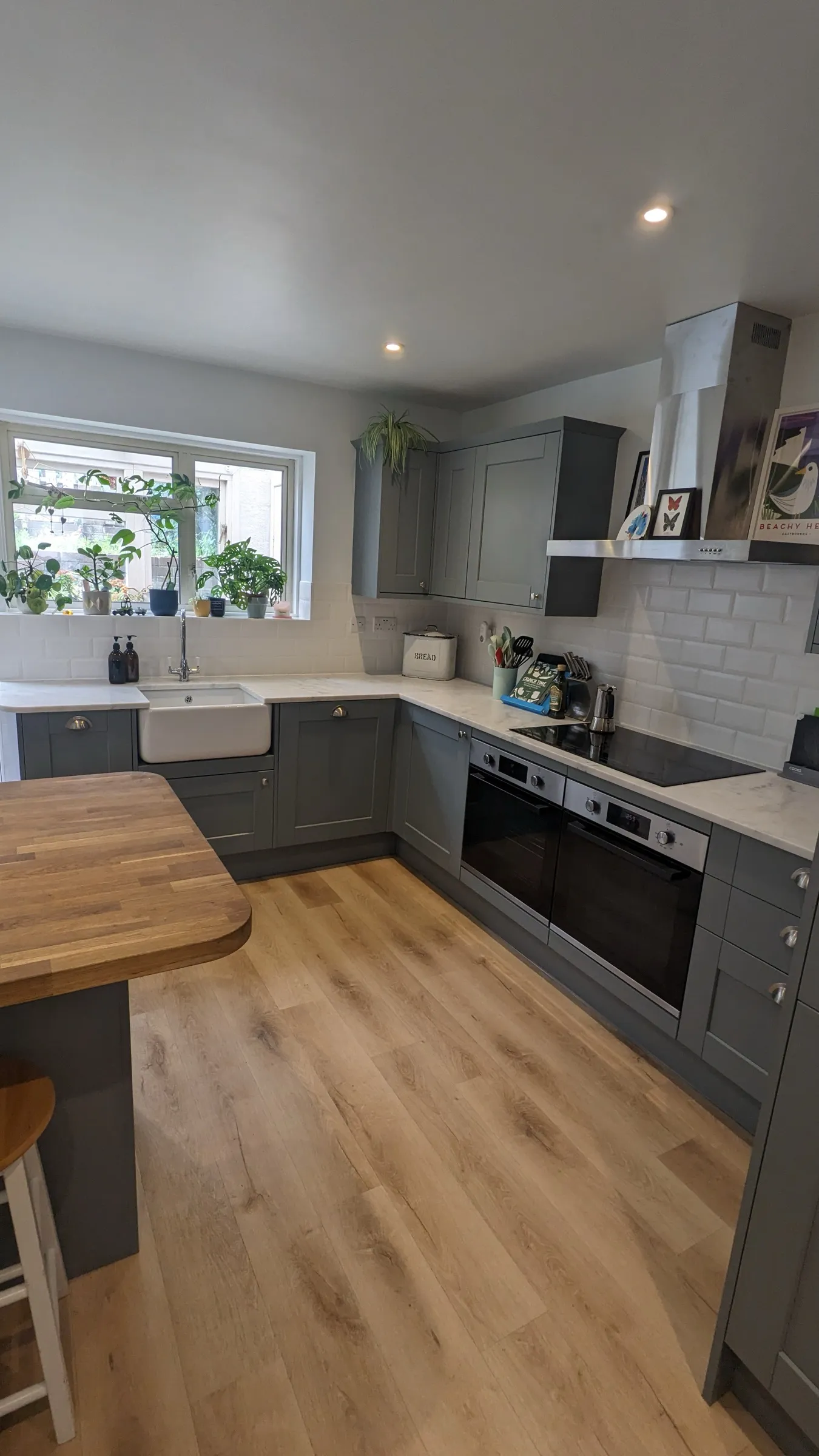 View from the island across to the Belfast sink and twin ovens